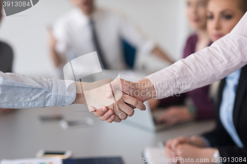 Image of business womans handshake