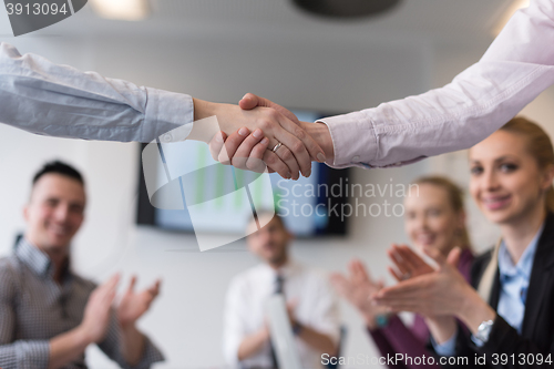 Image of business womans handshake