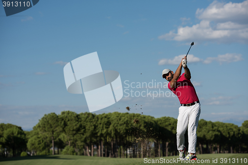 Image of golf player hitting long shot