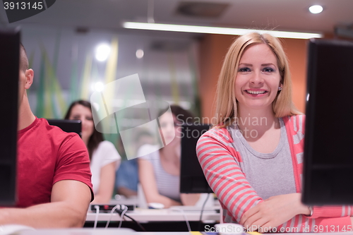 Image of technology students group working  in computer lab school  class