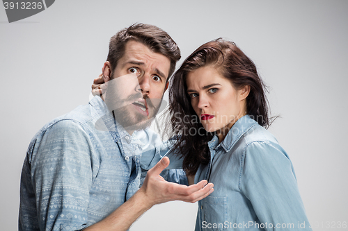 Image of The young couple with different emotions during conflict