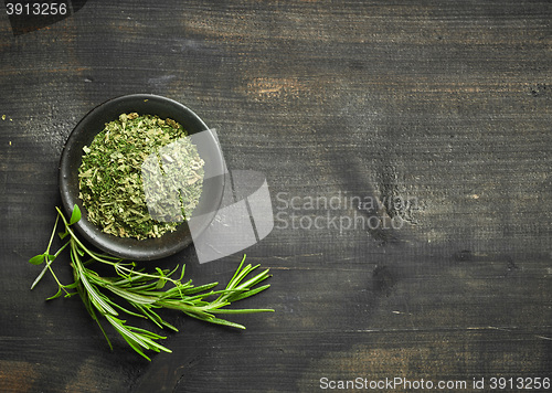 Image of fresh and dried rosemary