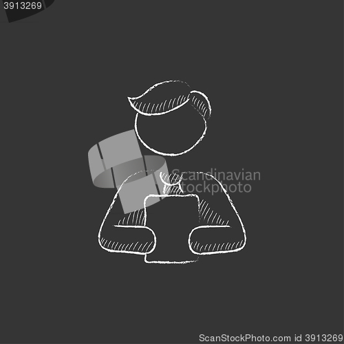 Image of Man holding digital tablet. Drawn in chalk icon.