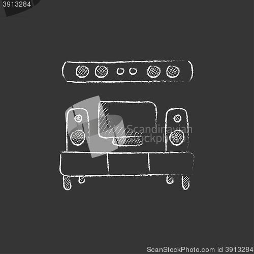 Image of TV flat screen and home theater. Drawn in chalk icon.