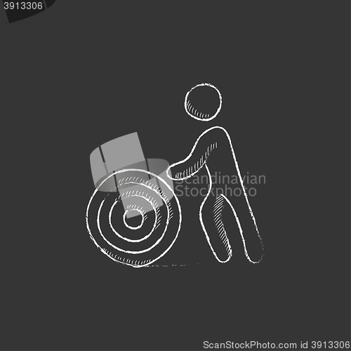 Image of Man with wire spool. Drawn in chalk icon.