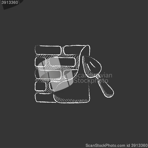 Image of Spatula with brickwall. Drawn in chalk icon.