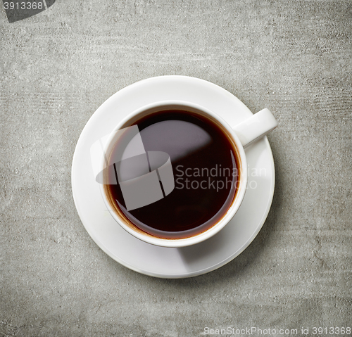 Image of cup of coffee on gray table