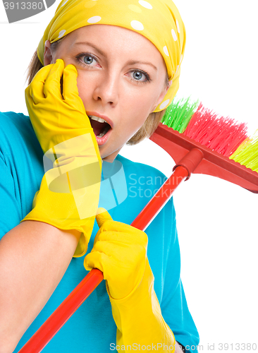 Image of Young woman as a cleaning maid