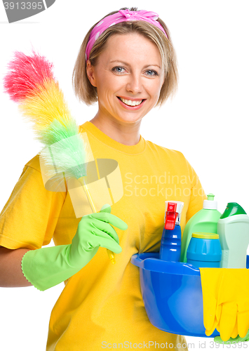 Image of Young woman as a cleaning maid