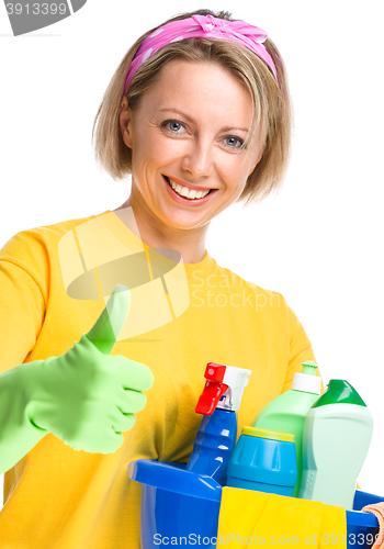 Image of Young woman as a cleaning maid