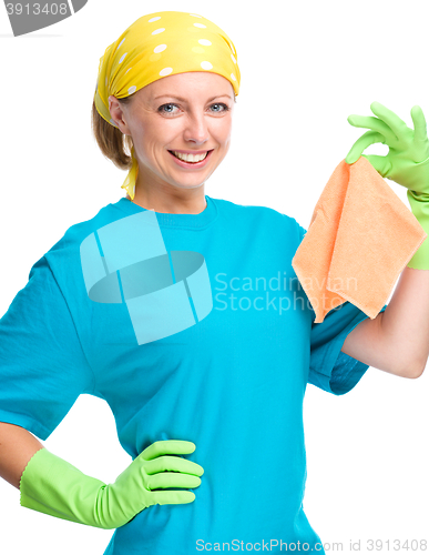 Image of Young woman holding cleaning rag