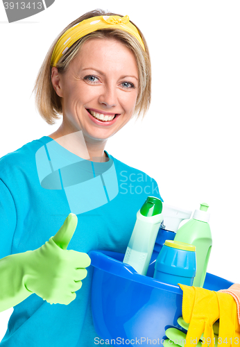 Image of Young woman as a cleaning maid