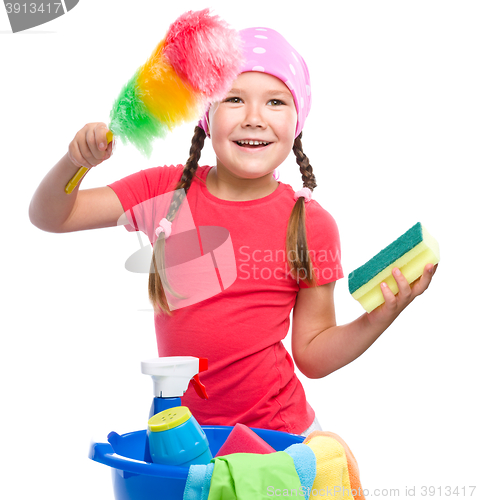 Image of Young girl is dressed as a cleaning maid