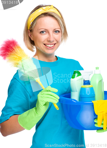 Image of Young woman as a cleaning maid