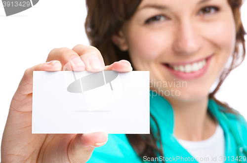 Image of Doctor is showing her business card