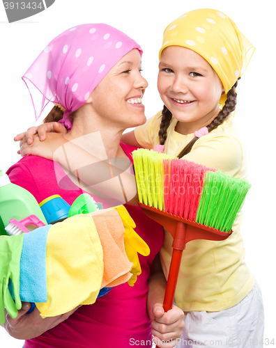 Image of Mother and her daughter are dressed for cleaning