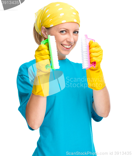 Image of Young woman as a cleaning maid