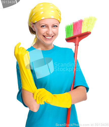 Image of Young woman as a cleaning maid