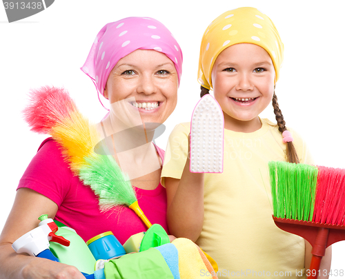 Image of Mother and her daughter are dressed for cleaning