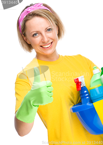 Image of Young woman as a cleaning maid