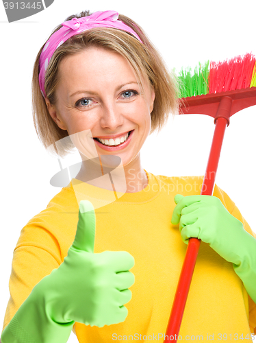 Image of Young woman as a cleaning maid