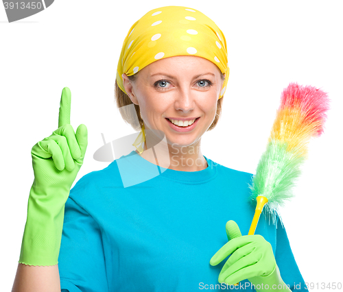 Image of Young woman as a cleaning maid