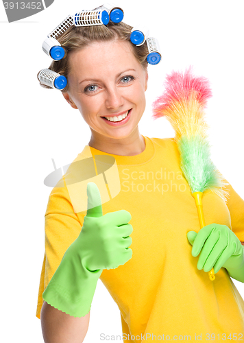 Image of Young woman as a cleaning maid