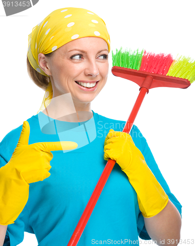 Image of Young woman as a cleaning maid