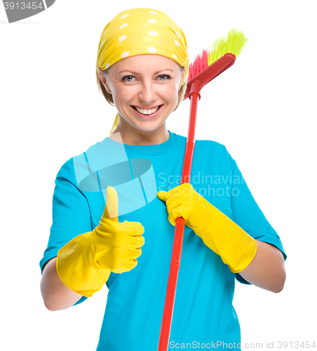 Image of Young woman as a cleaning maid