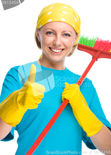 Image of Young woman as a cleaning maid