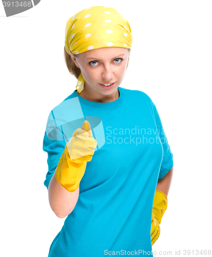 Image of Young woman as a cleaning maid