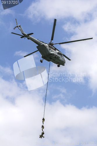 Image of Military special forces with a helicopter