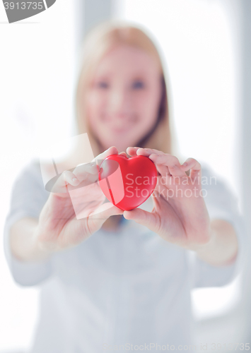 Image of female doctor with heart