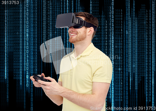 Image of happy man in virtual reality headset with gamepad