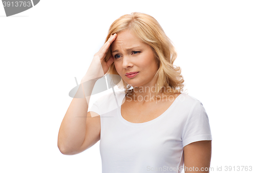 Image of unhappy woman suffering from headache