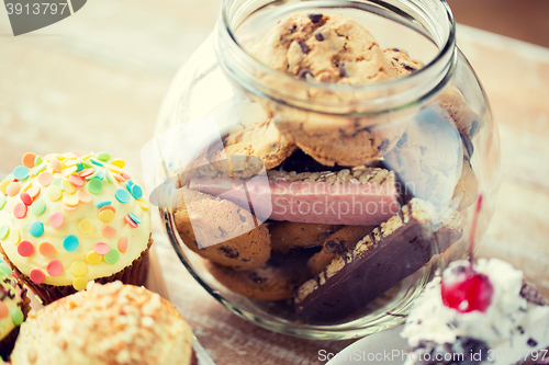 Image of close up of cupcakes, cookies and muesli bars