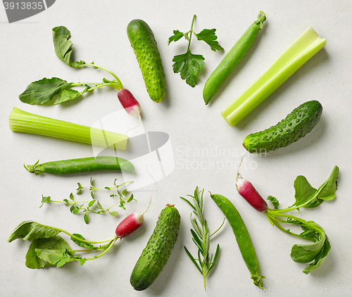Image of various fresh raw herbs and vegetables