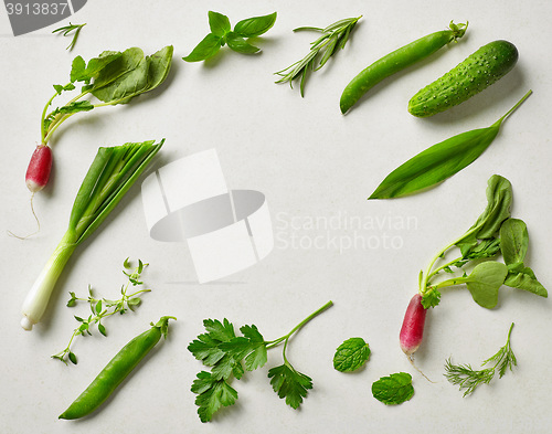 Image of various fresh raw herbs and vegetables