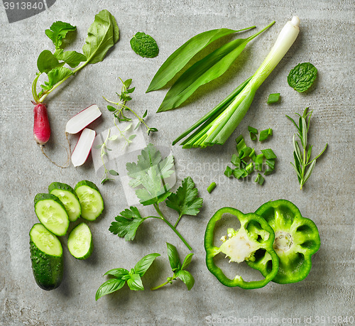 Image of various fresh herbs and vegetables