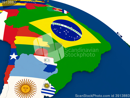 Image of Brazil on globe with flags