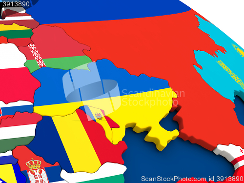 Image of Ukraine on globe with flags