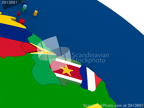 Image of Guyana, Suriname and French Guiana on globe with flags