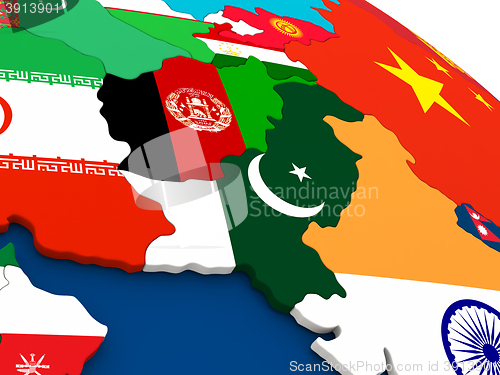 Image of Afghanistan and Pakistan on globe with flags