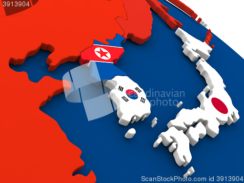 Image of South Korean and North Korea on globe with flags