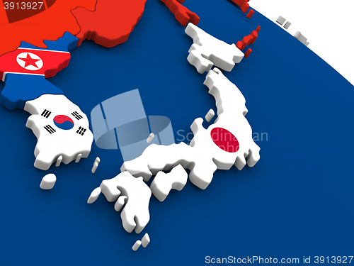 Image of Japan on globe with flags