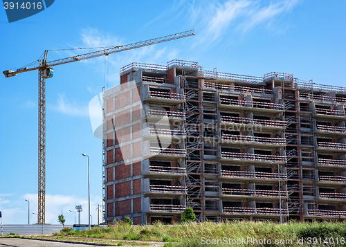 Image of Building Crane and Building Under Construction