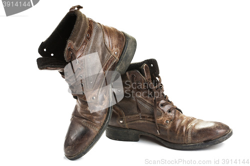 Image of Dirty old boots isolated. white background