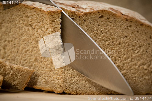 Image of A slice of bread with butter 