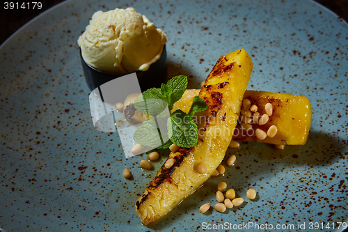 Image of Grilled pineapple with vanilla ice cream
