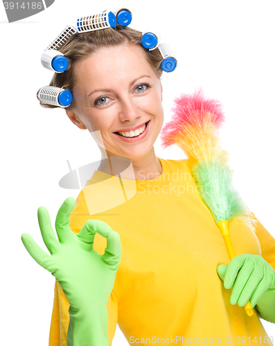 Image of Young woman as a cleaning maid